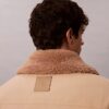 Abrigo de coche acolchado con cuello de sherpa
