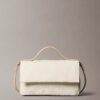 Bolso bandolera con solapa y Monogram integral