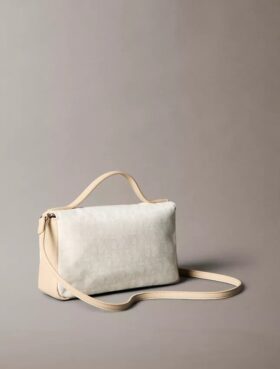 Bolso bandolera con solapa y Monogram integral