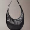 Bolso bandolera convertible con forma curvada