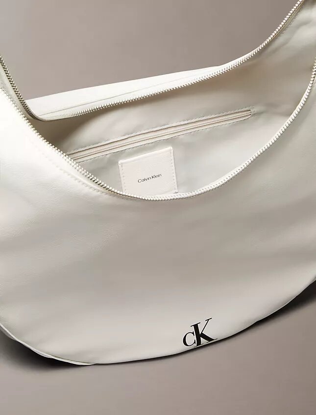 Bolso bandolera convertible con forma curvada Bolso bandolera convertible con forma curvada