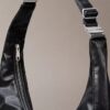 Bolso bandolera convertible con forma curvada