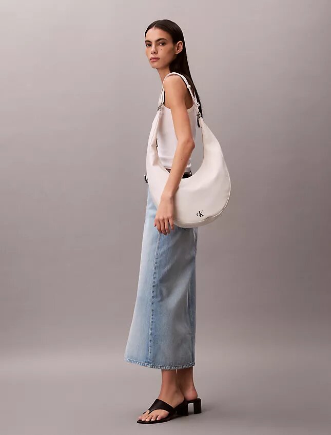 Bolso bandolera convertible con forma curvada Bolso bandolera convertible con forma curvada
