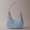 Bolso bandolera de Denim con logotipo en forma de media luna Bolso bandolera de Denim con logotipo en forma de media luna