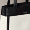 Bolso bandolera mini tote de lona Monogram Bolso bandolera mini tote de lona Monogram