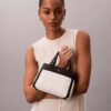 Bolso bandolera mini tote de lona Monogram Bolso bandolera mini tote de lona Monogram