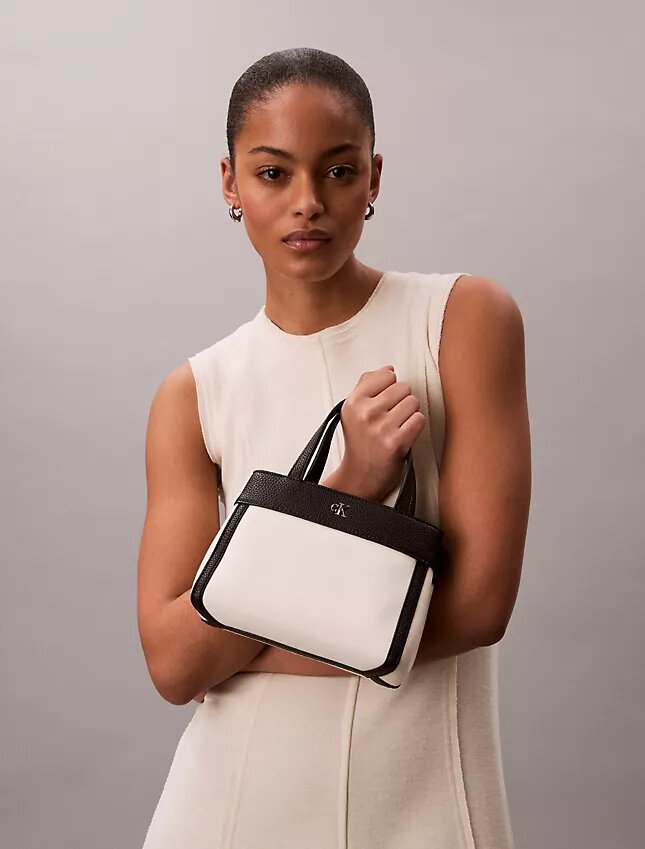 Bolso bandolera mini tote de lona Monogram Bolso bandolera mini tote de lona Monogram