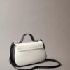 Bolso de hombro con asa de lona Monogram