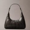 Bolso de hombro con logotipo estampado por toda la superficie Bolso de hombro con logotipo estampado por toda la superficie