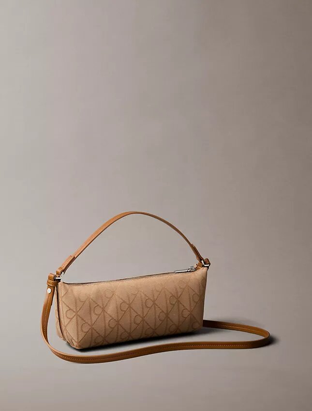 Bolso de hombro de lona con logotipo en todo el diseño Bolso de hombro de lona con logotipo en todo el diseño
