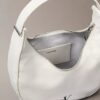 Bolso de hombro pequeño convertible con forma curvada Bolso de hombro pequeño convertible con forma curvada