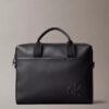 Bolso de viaje con monograma en relieve