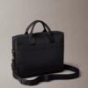 Bolso de viaje con monograma en relieve