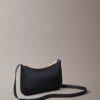 Bolso mini con Monogram llamativo
