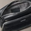 Bolso para cámara con logotipo en relieve por toda la superficie