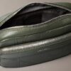 Bolso para cámara con logotipo en relieve por toda la superficie