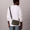 Bolso para cámara con logotipo en relieve por toda la superficie