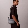 Bolso para cámara con textura granulada Bolso para cámara con textura granulada