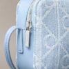 Bolso para cámara de Denim con logotipo en todo el diseño Bolso para cámara de Denim con logotipo en todo el diseño