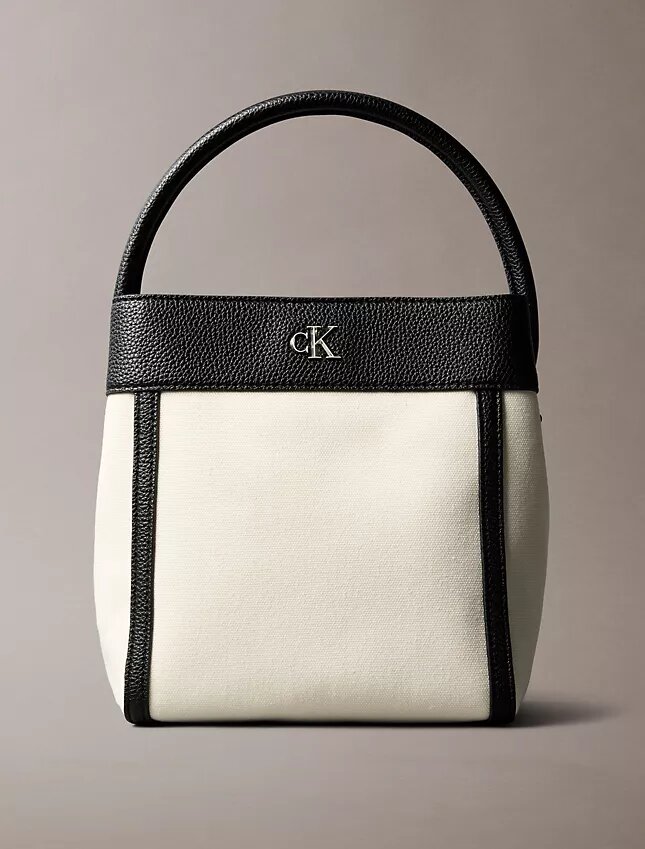 Bolso tipo cubo de lona Monogram Bolso tipo cubo de lona Monogram
