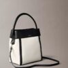 Bolso tipo cubo de lona Monogram Bolso tipo cubo de lona Monogram
