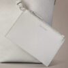 Bolso tipo cubo pequeño con estampado de logotipo en todo el diseño y bolsillo interior Bolso tipo cubo pequeño con estampado de logotipo en todo el diseño y bolsillo interior