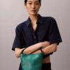 Bolso tipo cubo pequeño con estampado de logotipo en todo el diseño y bolsillo interior Bolso tipo cubo pequeño con estampado de logotipo en todo el diseño y bolsillo interior
