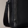 Bolso tipo reportero delgado con logotipo