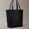 Bolso tote con el logotipo del emblema por toda la superficie