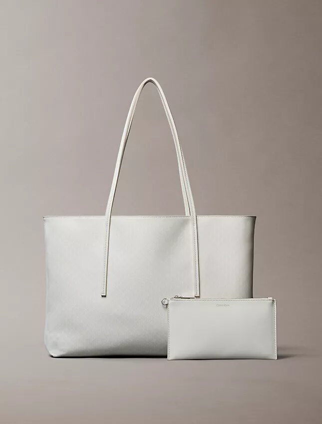 Bolso tote con el logotipo del emblema por toda la superficie y bolsillo Bolso tote con el logotipo del emblema por toda la superficie y bolsillo
