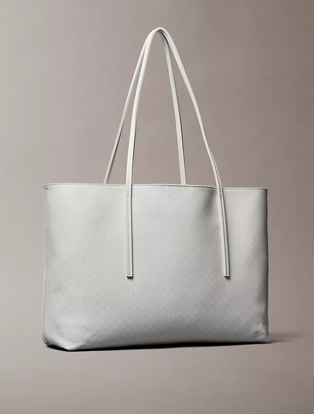 Bolso tote con el logotipo del emblema por toda la superficie y bolsillo Bolso tote con el logotipo del emblema por toda la superficie y bolsillo