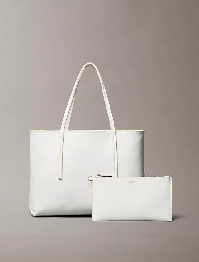 Bolso tote pequeño con estampado del logotipo en todo el tejido y bolsillo Bolso tote pequeño con estampado del logotipo en todo el tejido y bolsillo