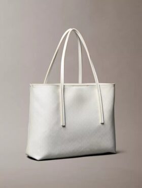 Bolso tote pequeño con estampado del logotipo en todo el tejido y bolsillo