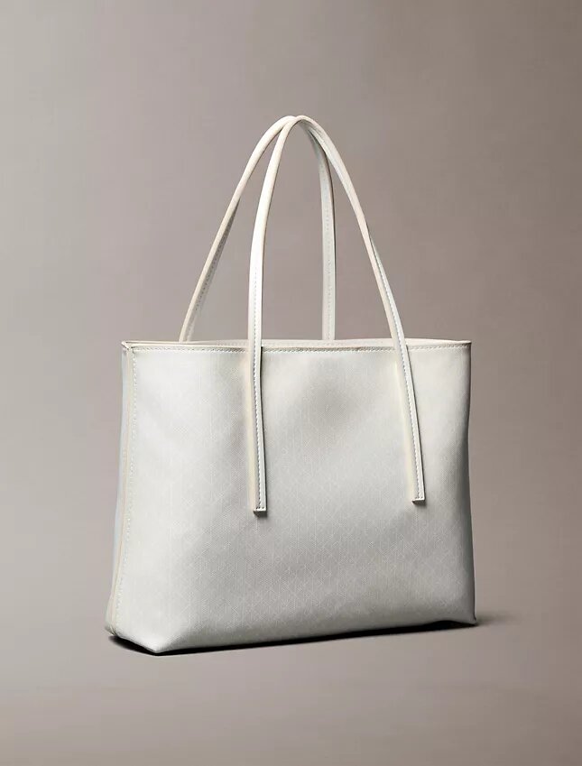 Bolso tote pequeño con estampado del logotipo en todo el tejido y bolsillo Bolso tote pequeño con estampado del logotipo en todo el tejido y bolsillo