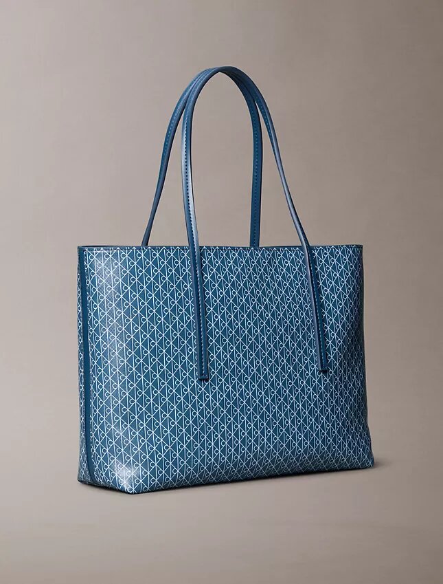 Bolso tote pequeño con estampado del logotipo en todo el tejido y bolsillo Bolso tote pequeño con estampado del logotipo en todo el tejido y bolsillo