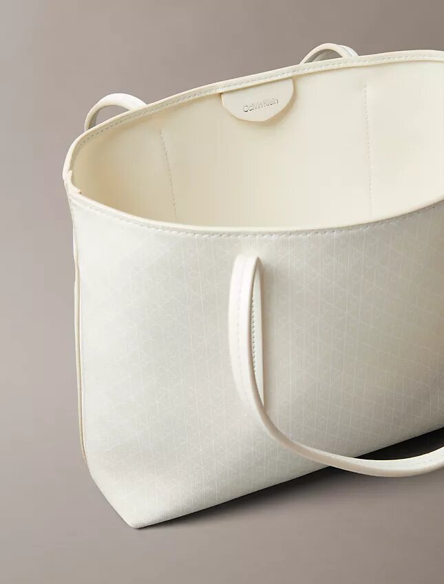 Bolso tote pequeño con estampado del logotipo en todo el tejido y bolsillo Bolso tote pequeño con estampado del logotipo en todo el tejido y bolsillo