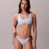 Braguita de bikini con lazo lateral y monograma gráfico Braguita de bikini con lazo lateral y monograma gráfico
