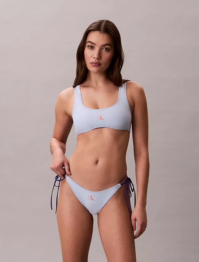 Braguita de bikini con lazo lateral y monograma gráfico Braguita de bikini con lazo lateral y monograma gráfico