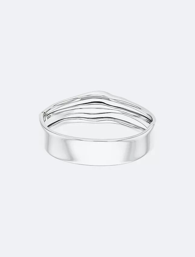Brazalete con bisagra de forma fluida y escultural Brazalete con bisagra de forma fluida y escultural