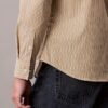 Camisa ajustada elástica a rayas con botones Camisa ajustada elástica a rayas con botones