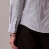 Camisa clásica de algodón elástico a rayas con cuello abotonado Camisa clásica de algodón elástico a rayas con cuello abotonado
