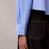 Camisa corta de popelín con botones y corte holgado Camisa corta de popelín con botones y corte holgado