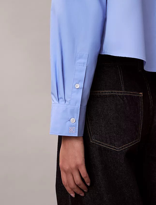 Camisa corta de popelín con botones y corte holgado Camisa corta de popelín con botones y corte holgado