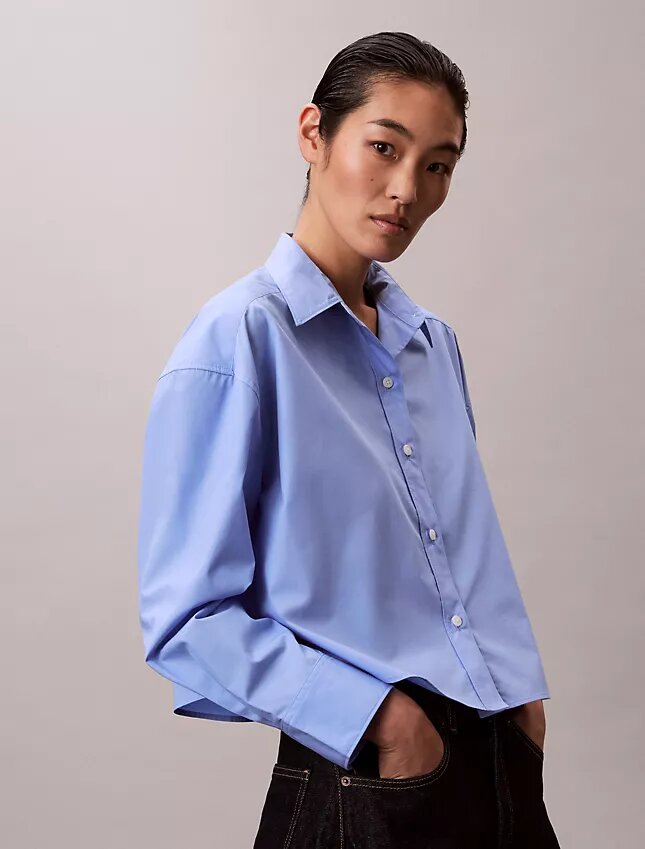 Camisa corta de popelín con botones y corte holgado Camisa corta de popelín con botones y corte holgado