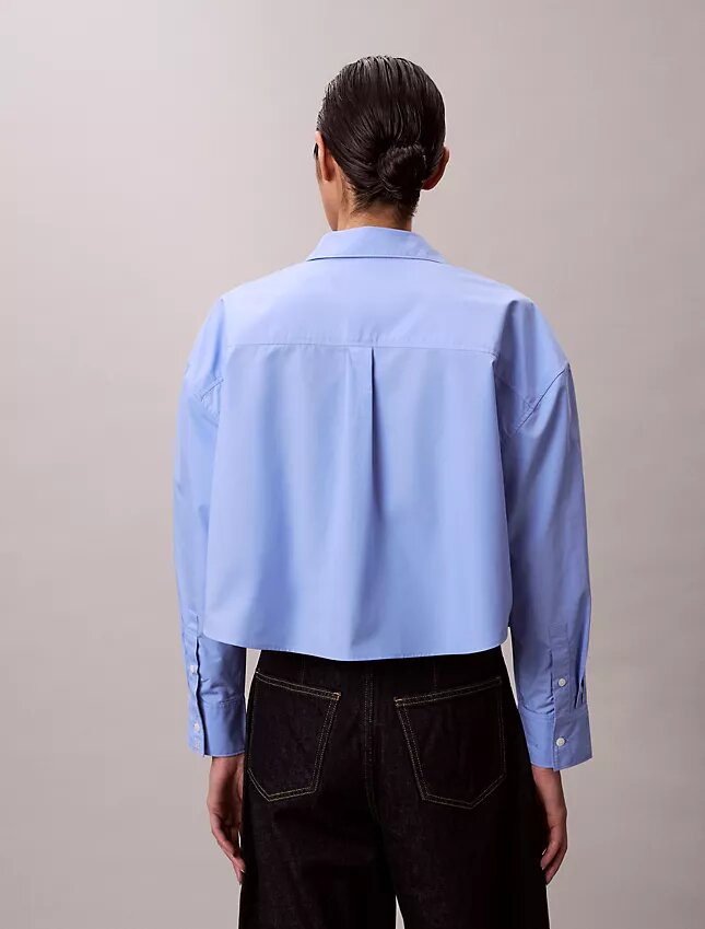 Camisa corta de popelín con botones y corte holgado Camisa corta de popelín con botones y corte holgado