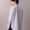 Camisa de algodón lisa de corte holgado con botones Camisa de algodón lisa de corte holgado con botones