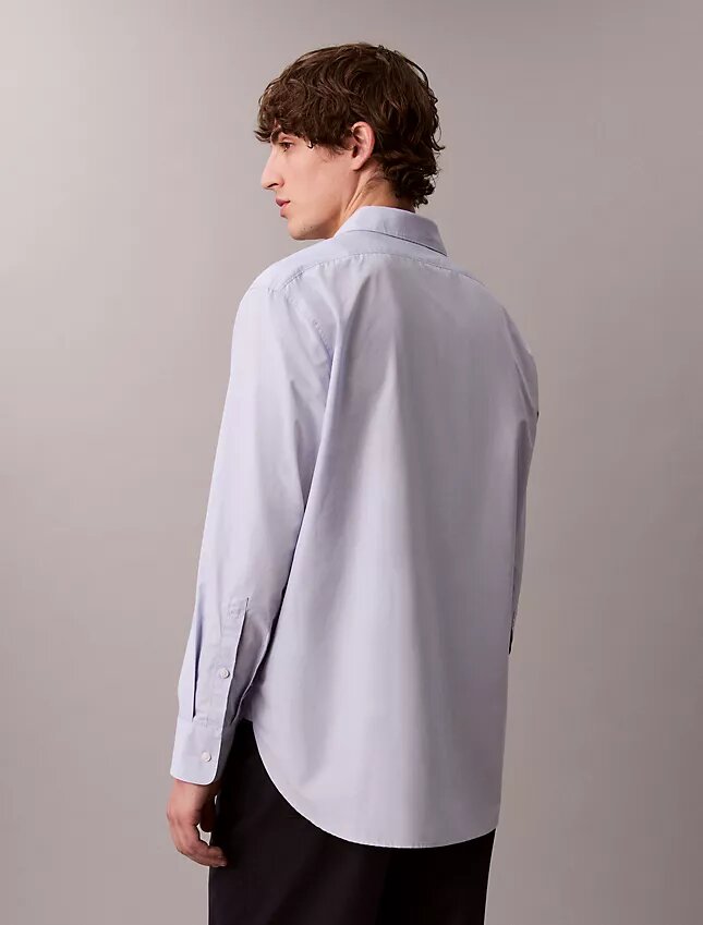 Camisa de algodón lisa de corte holgado con botones Camisa de algodón lisa de corte holgado con botones
