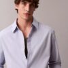 Camisa de algodón lisa de corte holgado con botones Camisa de algodón lisa de corte holgado con botones