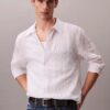Camisa de botones holgada con rayas arrugadas teñidas en hilo Camisa de botones holgada con rayas arrugadas teñidas en hilo