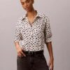 Camisa de lyocell con solapa enrollada y botones